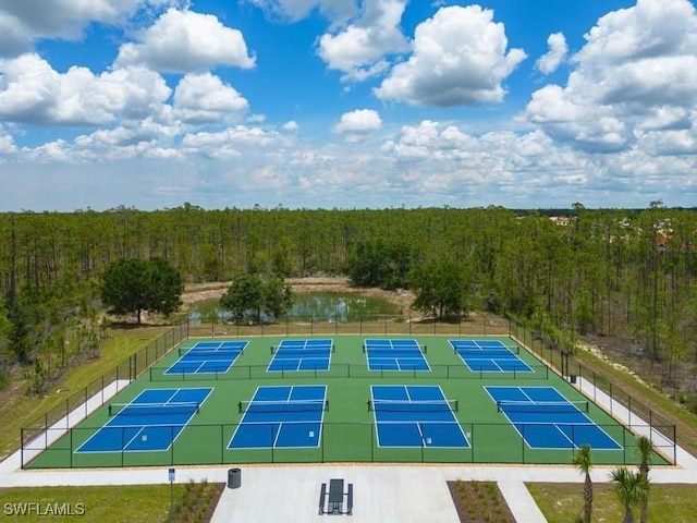 aerial view featuring a wooded view