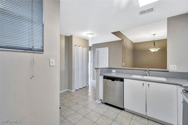 4109 Bellasol Cir Unit 1113, Fort Myers, FL 33916 - kitchen featuring pendant lighting, light countertops, visible vents, stainless steel dishwasher, and white cabinetry