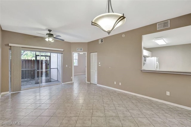 4109 Bellasol Cir Unit 1113, Fort Myers, FL 33916 - unfurnished room with light tile patterned flooring, visible vents, and baseboards