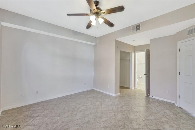 4109 Bellasol Cir Unit 1113, Fort Myers, FL 33916 - empty room with a ceiling fan, visible vents, and baseboards
