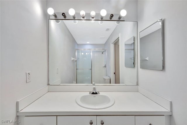 4109 Bellasol Cir Unit 1113, Fort Myers, FL 33916 - bathroom with a stall shower, vanity, and toilet