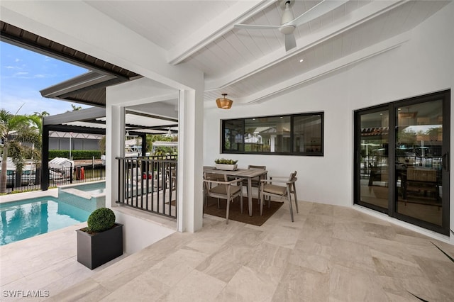 view of patio with outdoor dining space, an outdoor pool, and fence