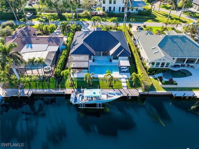 aerial view with a residential view and a water view