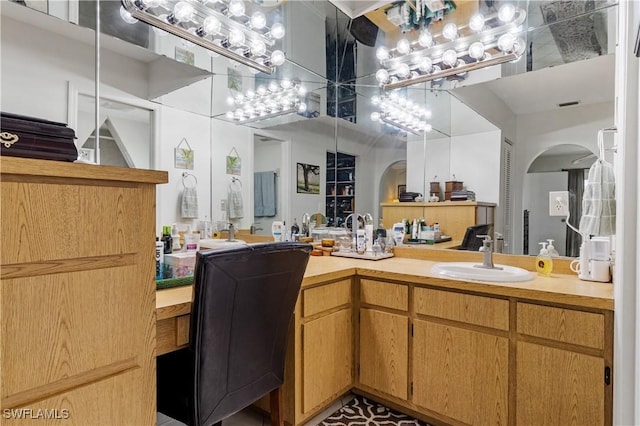 bathroom with visible vents and a sink