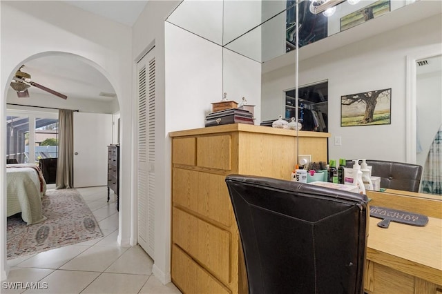 kitchen with light tile patterned flooring, ceiling fan, and visible vents