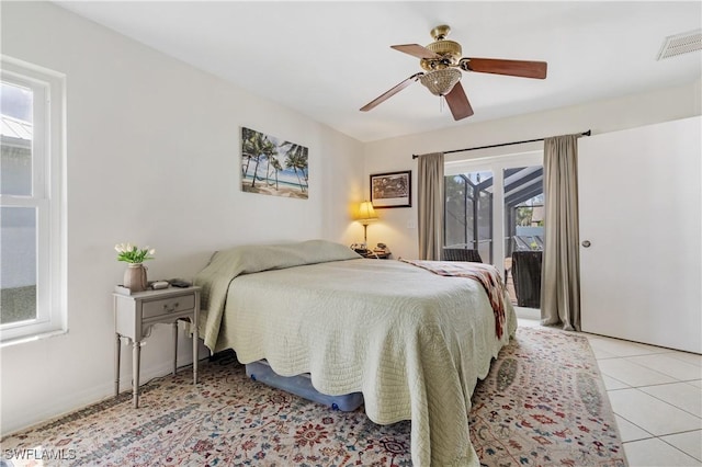 bedroom with light tile patterned floors, access to outside, visible vents, and ceiling fan