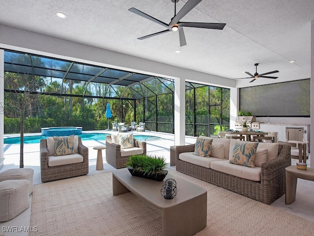 exterior space featuring ceiling fan and a pool