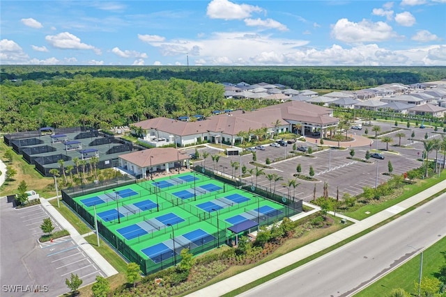 bird's eye view with a residential view and a view of trees