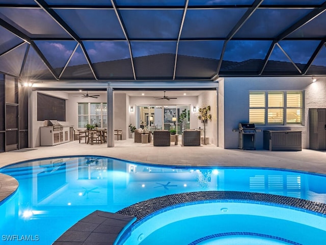 view of swimming pool featuring a patio, a lanai, an outdoor hangout area, area for grilling, and a pool with connected hot tub