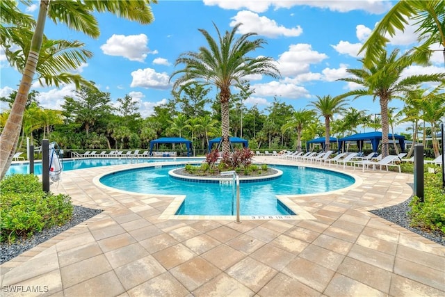 pool with a patio area