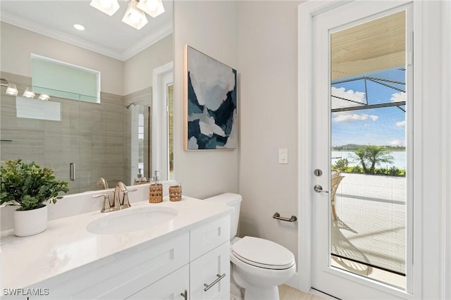 full bath with vanity, a skylight, a stall shower, crown molding, and toilet