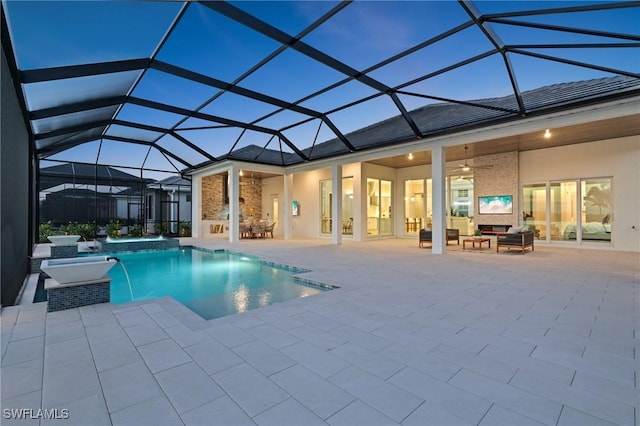 pool with outdoor lounge area, a patio, glass enclosure, and a ceiling fan