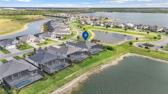 aerial view with a residential view and a water view