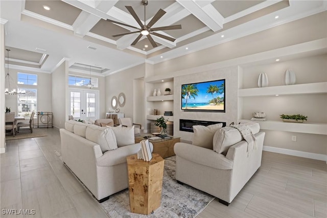 living room with baseboards, built in shelves, coffered ceiling, and crown molding