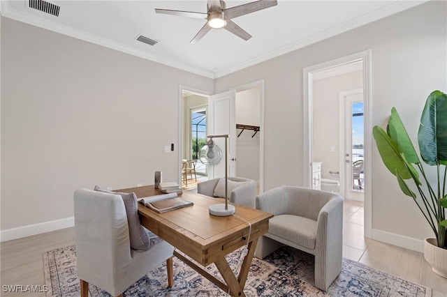 home office featuring visible vents, ceiling fan, and ornamental molding