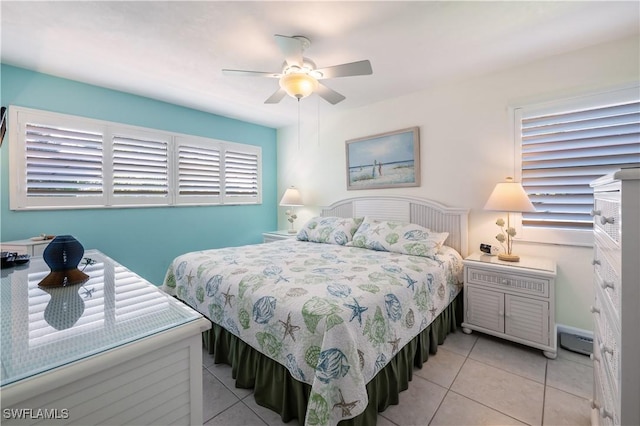 bedroom featuring light tile patterned flooring and ceiling fan