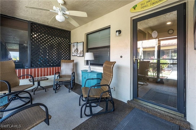 view of patio featuring a ceiling fan