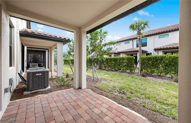 view of patio with central AC