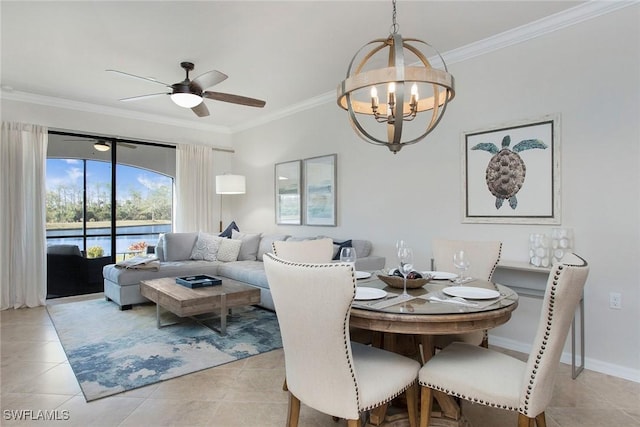 dining area with light tile patterned floors, baseboards, ornamental molding, and ceiling fan with notable chandelier