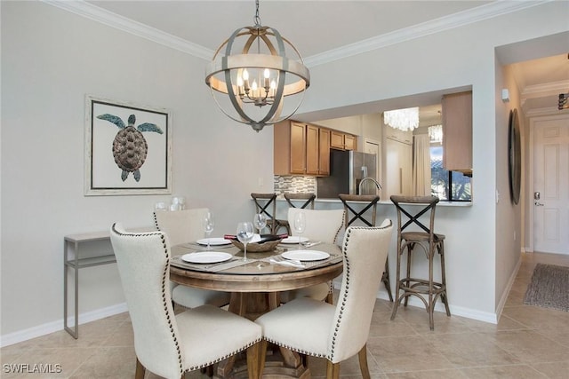 dining area featuring baseboards, ornamental molding, light tile patterned floors, and an inviting chandelier