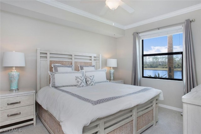 bedroom with ceiling fan, baseboards, crown molding, and light colored carpet