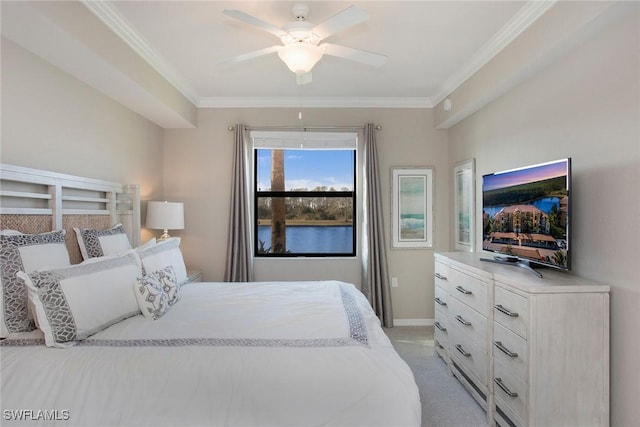 bedroom with light carpet, ornamental molding, a ceiling fan, and baseboards