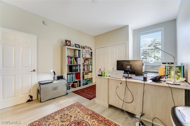 office area with wood finished floors