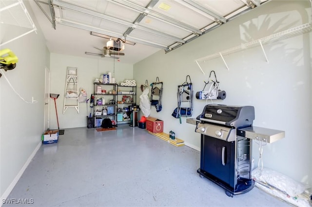 garage featuring baseboards and a garage door opener