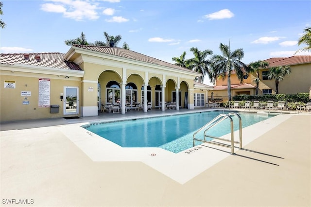 pool with a patio