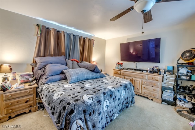 bedroom featuring ceiling fan and light colored carpet