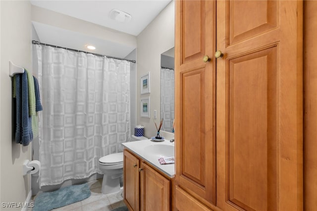 bathroom featuring a shower with shower curtain, vanity, toilet, and tile patterned floors