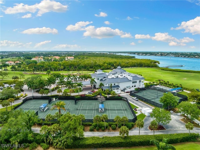 bird's eye view with view of golf course and a water view