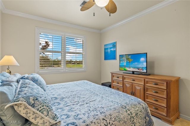 bedroom with a ceiling fan, light colored carpet, visible vents, and crown molding