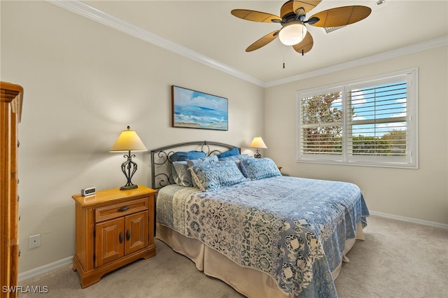 bedroom with light carpet, ornamental molding, and baseboards