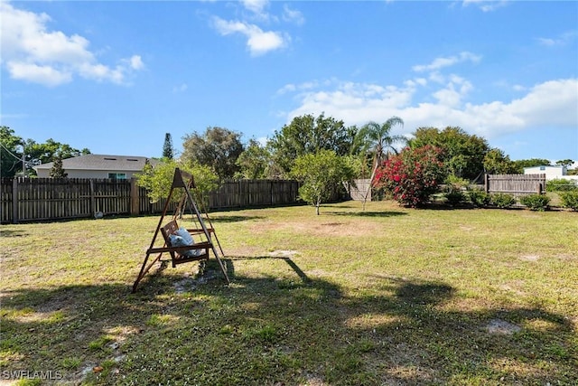 view of yard featuring a fenced backyard