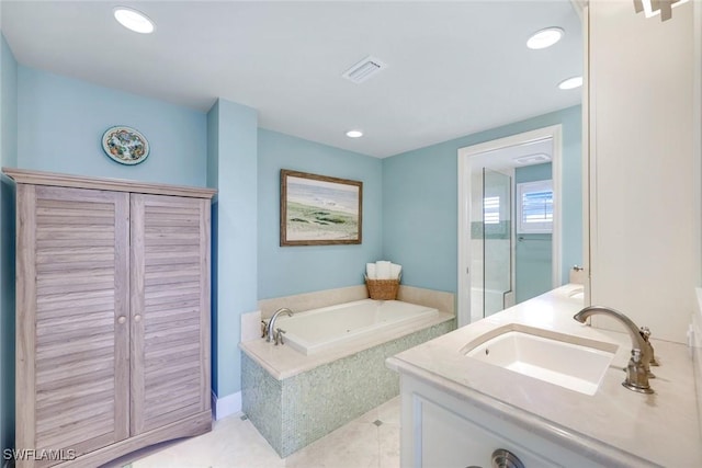 full bathroom featuring recessed lighting, visible vents, vanity, a bath, and tile patterned floors