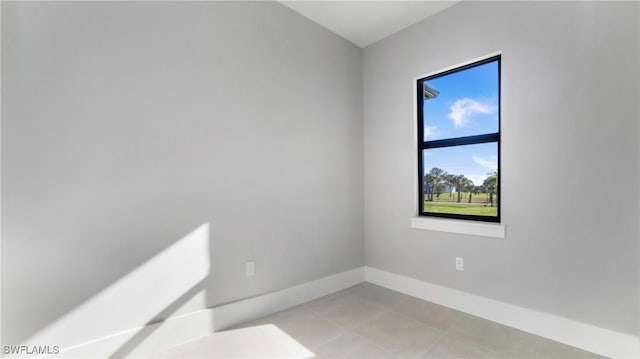 empty room with baseboards