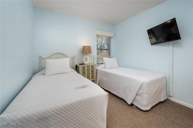 845 E Gulf Dr Unit 232, Sanibel, FL 33957 - carpeted bedroom featuring baseboards