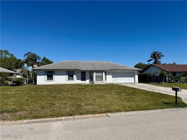 ranch-style house featuring a garage, concrete driveway, a front yard, and stucco siding