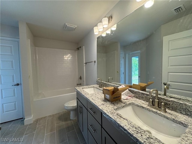 106 SE 5th Ave, Cape Coral, FL 33990 - full bath with double vanity, toilet, and tub / shower combination