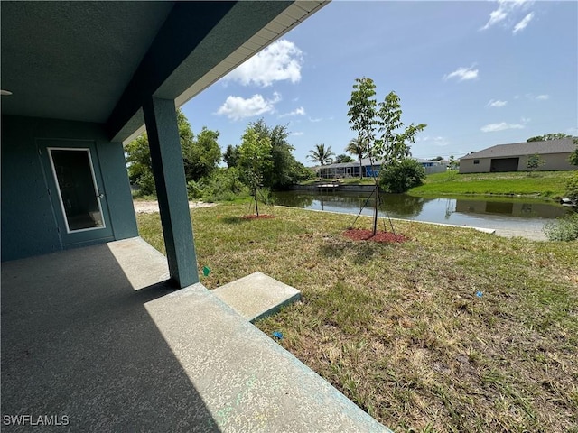 106 SE 5th Ave, Cape Coral, FL 33990 - view of green lawn with a water view