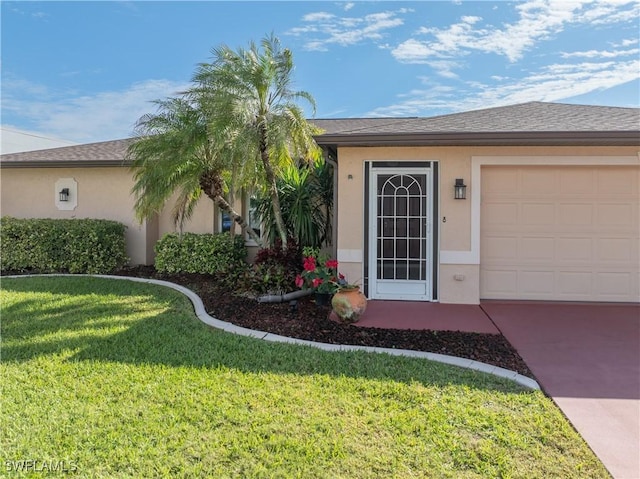 property entrance with a yard, roof with shingles, and stucco siding