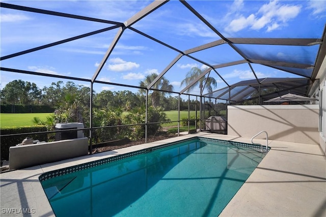 outdoor pool featuring a lanai and a patio