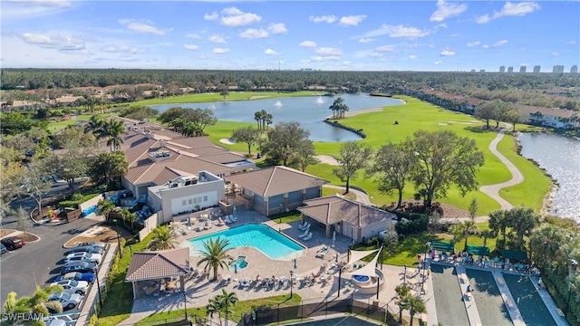 bird's eye view featuring a water view and view of golf course