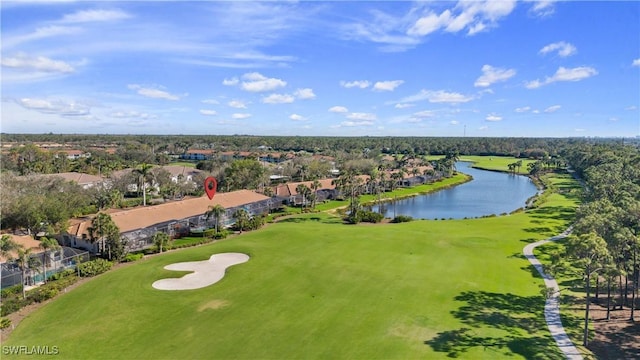 bird's eye view with a water view and golf course view