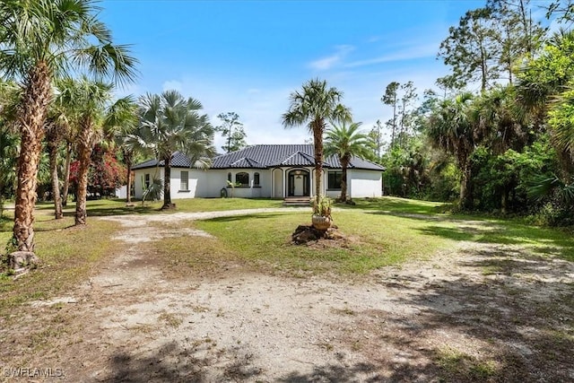 1240 Desoto Blvd S, Naples, FL 34117 - view of front facade with driveway and a front yard