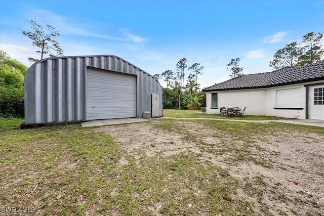 1240 Desoto Blvd S, Naples, FL 34117 - detached garage with dirt driveway