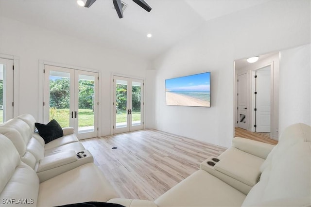 1240 Desoto Blvd S, Naples, FL 34117 - living room featuring french doors, ceiling fan, wood finished floors, and vaulted ceiling