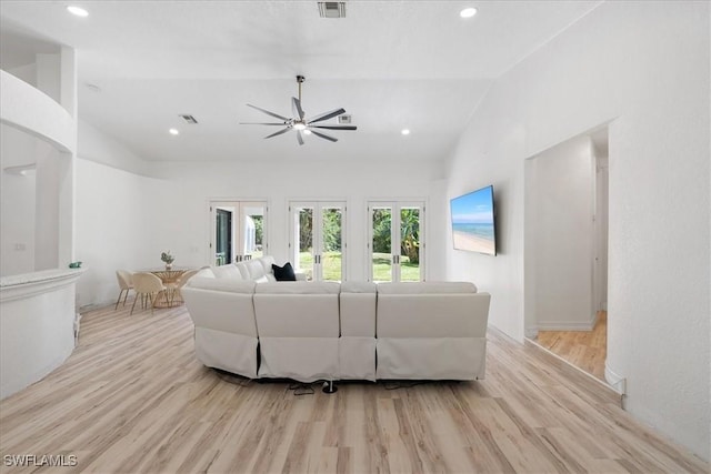 1240 Desoto Blvd S, Naples, FL 34117 - living room featuring lofted ceiling, light wood-style flooring, ceiling fan, recessed lighting, and french doors