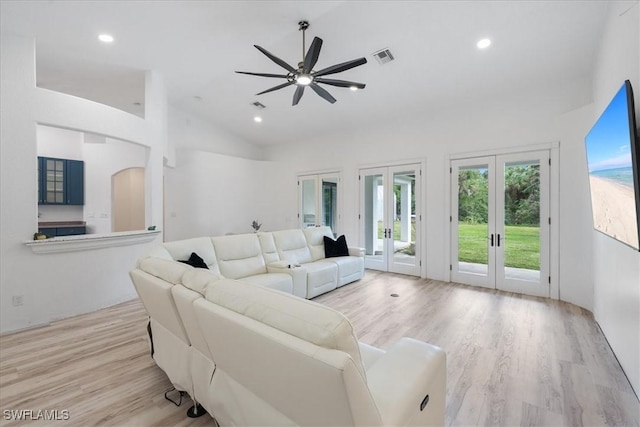 1240 Desoto Blvd S, Naples, FL 34117 - living room featuring french doors, ceiling fan, wood finished floors, recessed lighting, and high vaulted ceiling